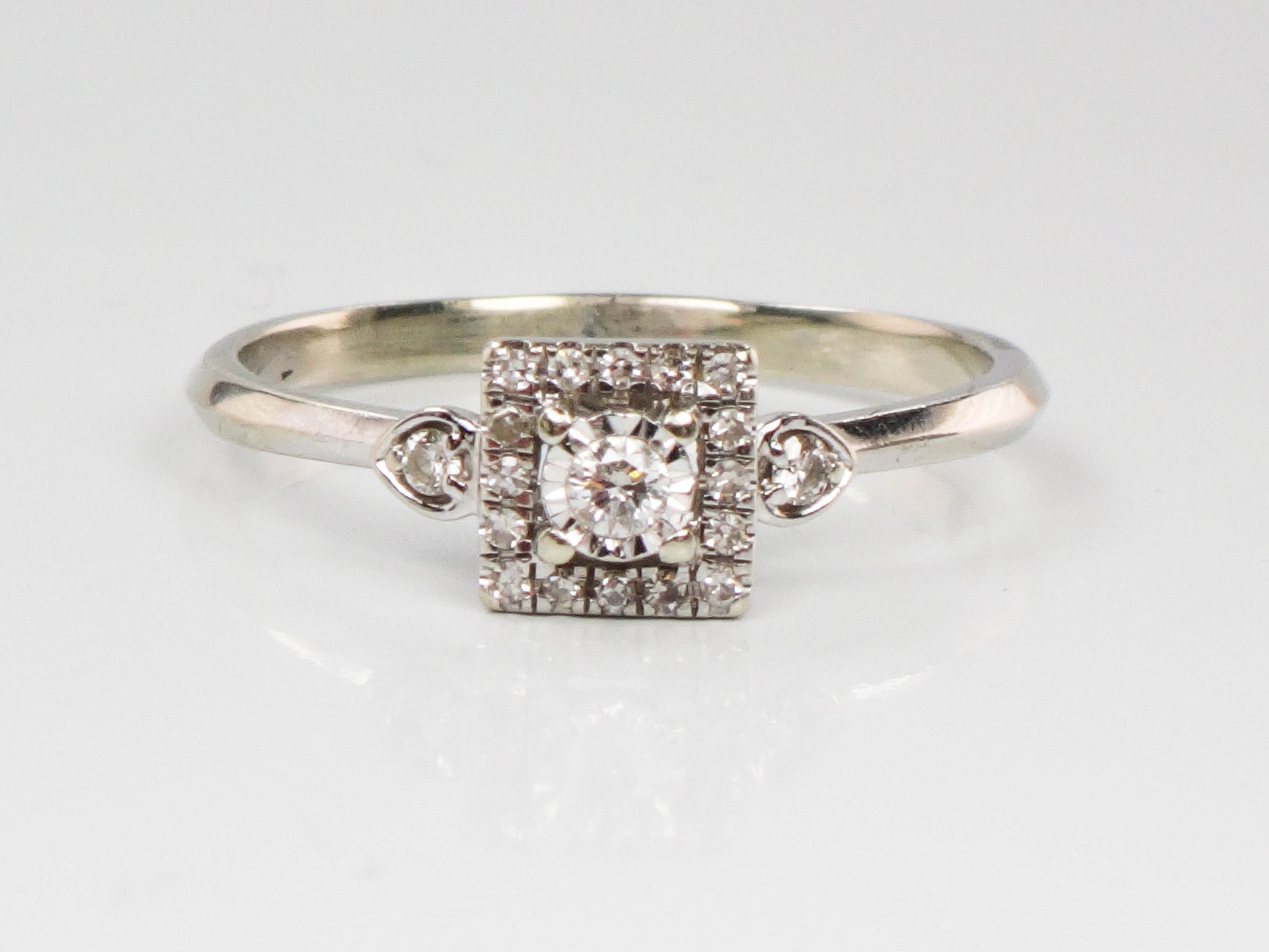 10k Diamond Engagement Ring with Ruby Accents