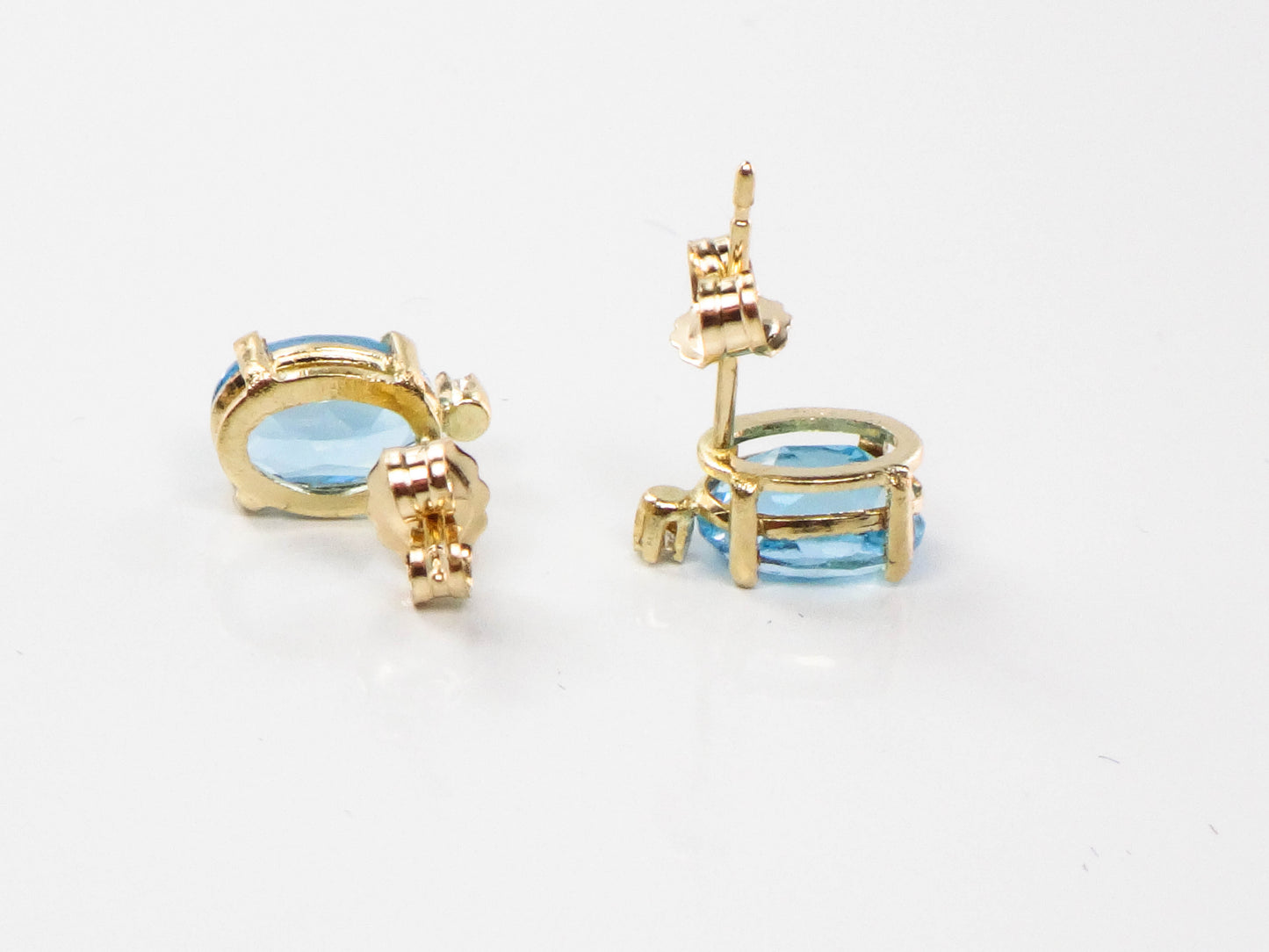 Pre-Owned 14k Yellow Gold Blue Topaz Stud Earrings with White Sapphire Accents, Oval December Birthstone Studs