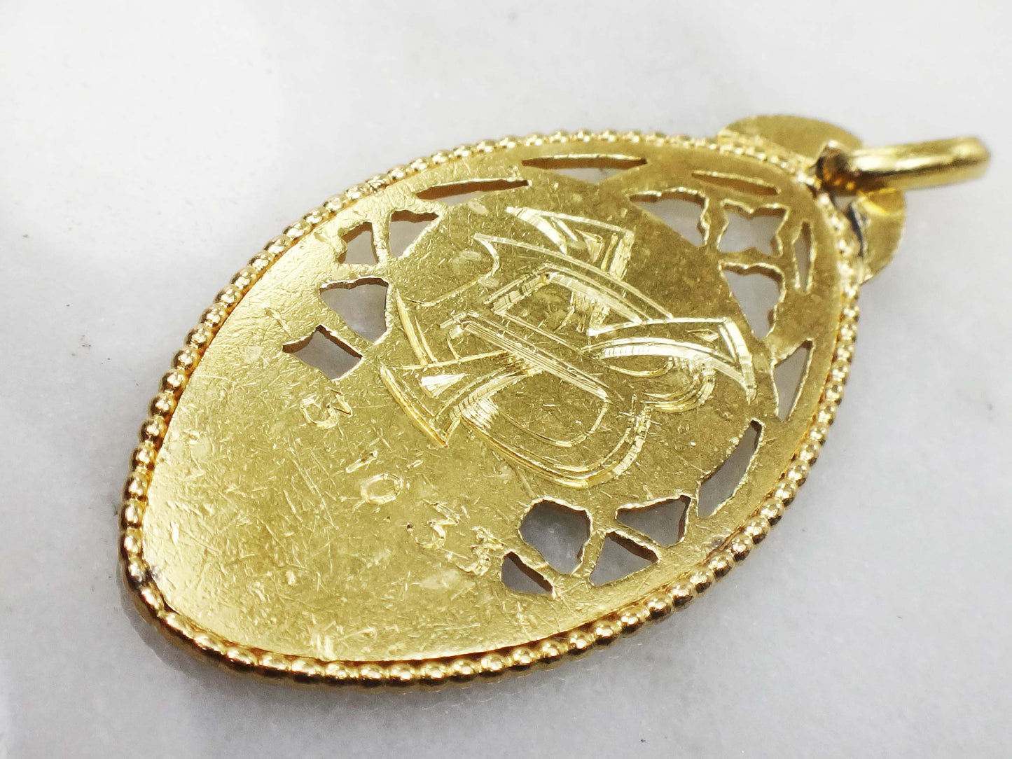 Vintage 18k Yellow Gold Virgin Mary Medal: Religious Charm, Circa 1930s