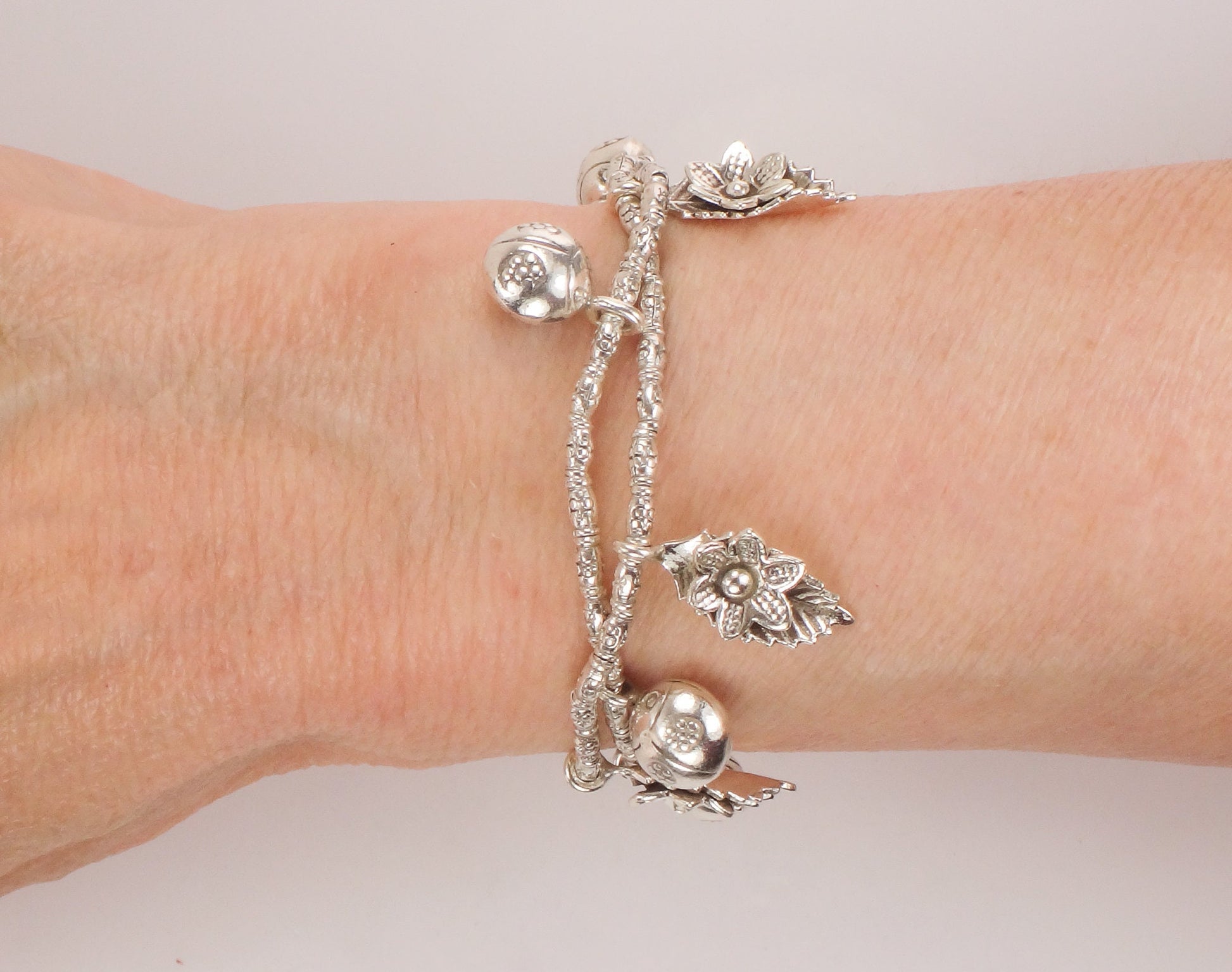 Sterling Silver Ladybug and Flower Charm Bracelet Flexible 7"