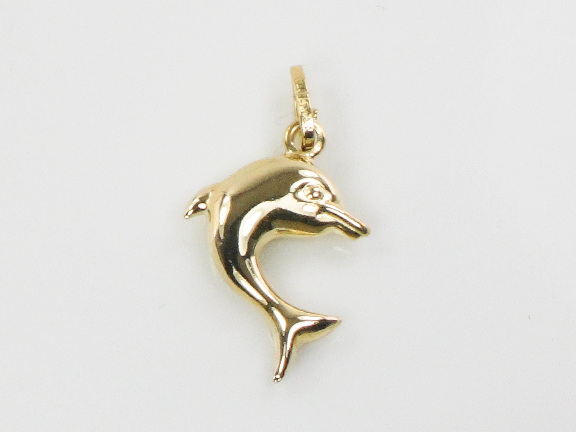 Vintage 14k Yellow Gold Puffed Dolphin Pendant: Nautical Charm