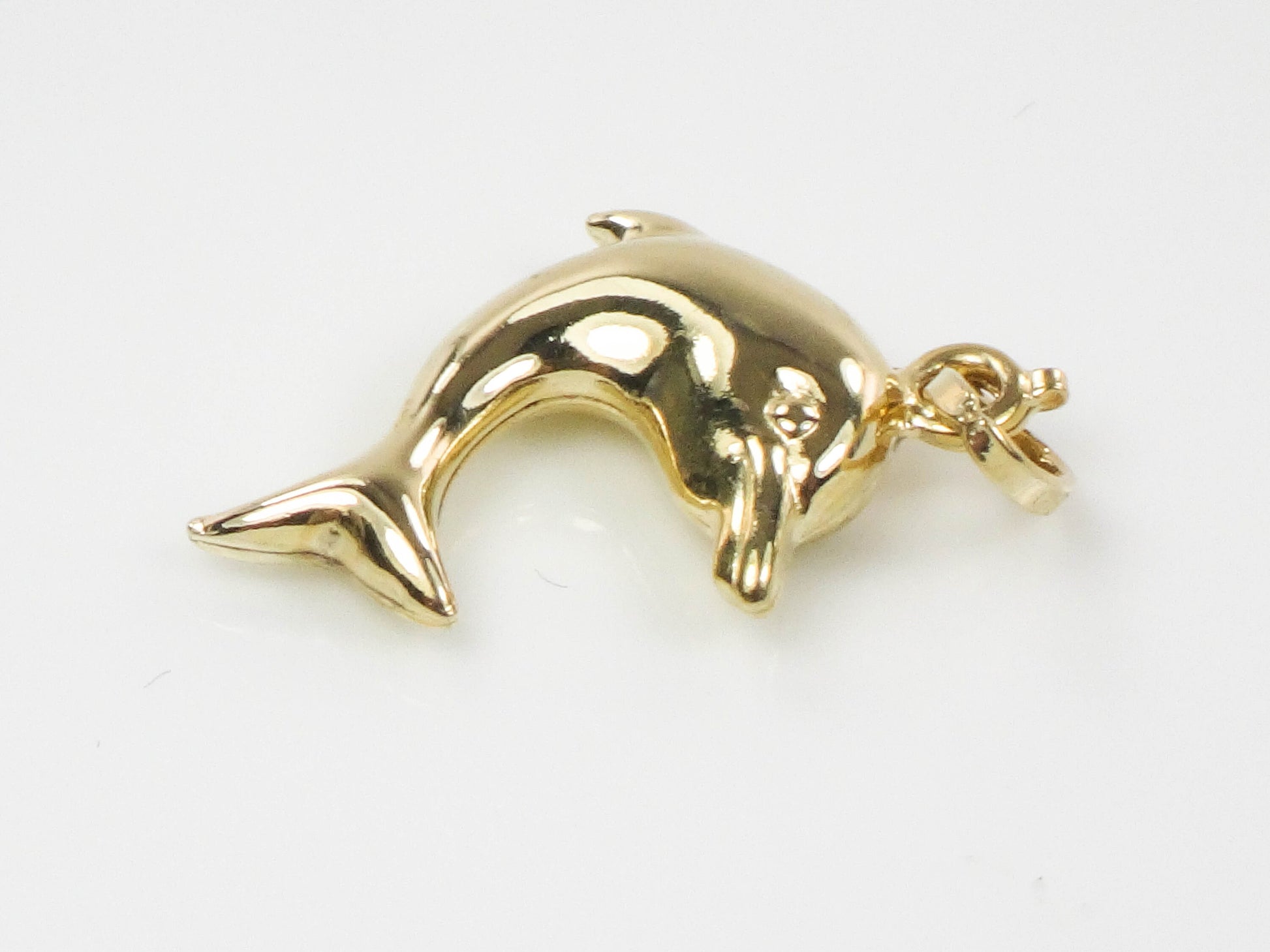 Vintage 14k Yellow Gold Puffed Dolphin Pendant: Nautical Charm