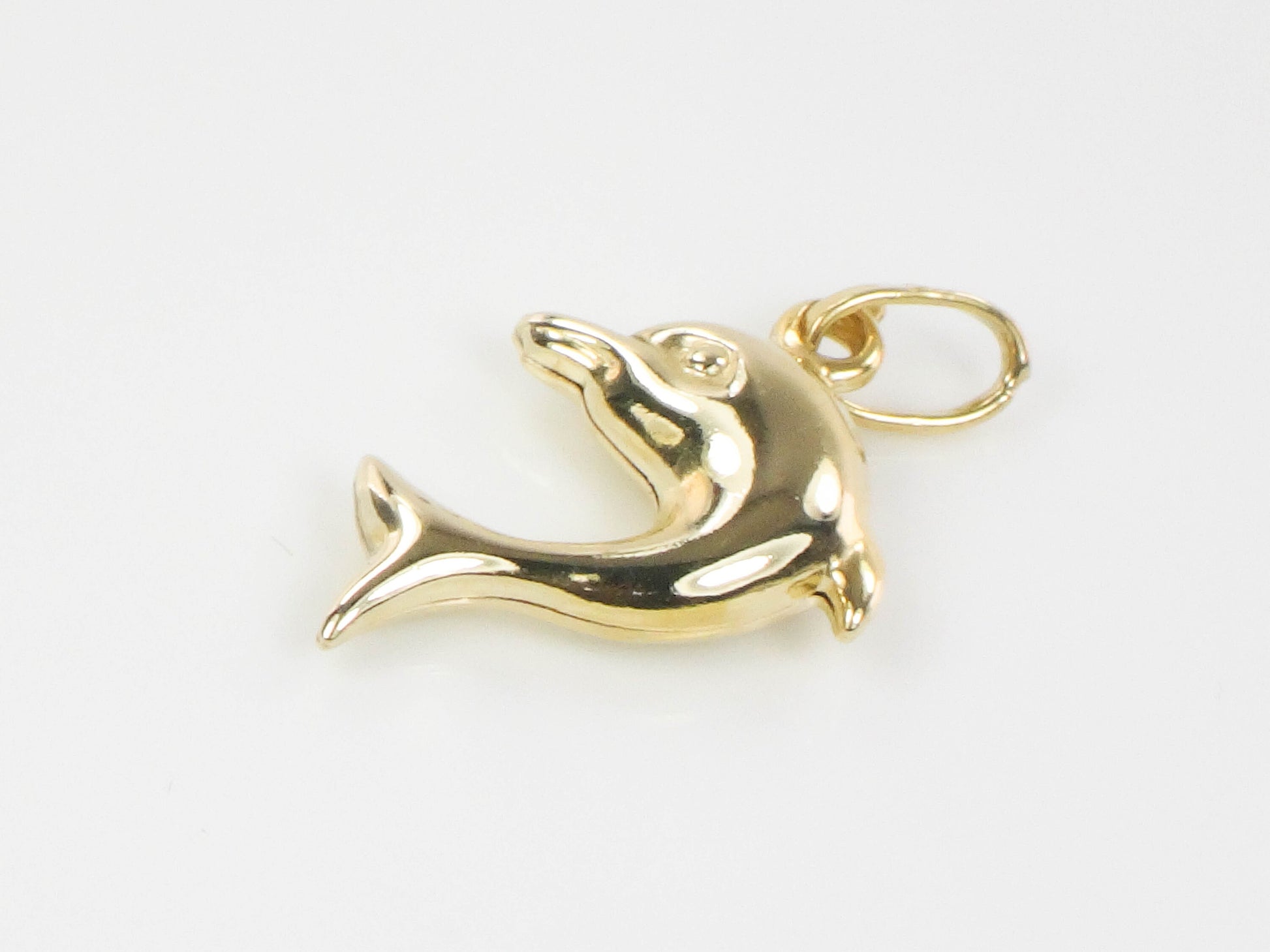 Vintage 14k Yellow Gold Puffed Dolphin Pendant: Nautical Charm