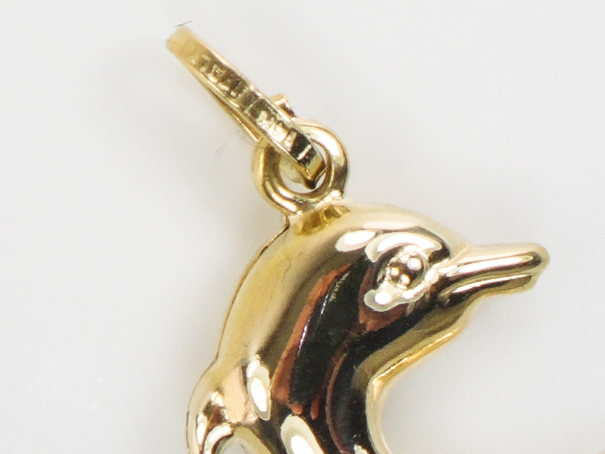 Vintage 14k Yellow Gold Puffed Dolphin Pendant: Nautical Charm