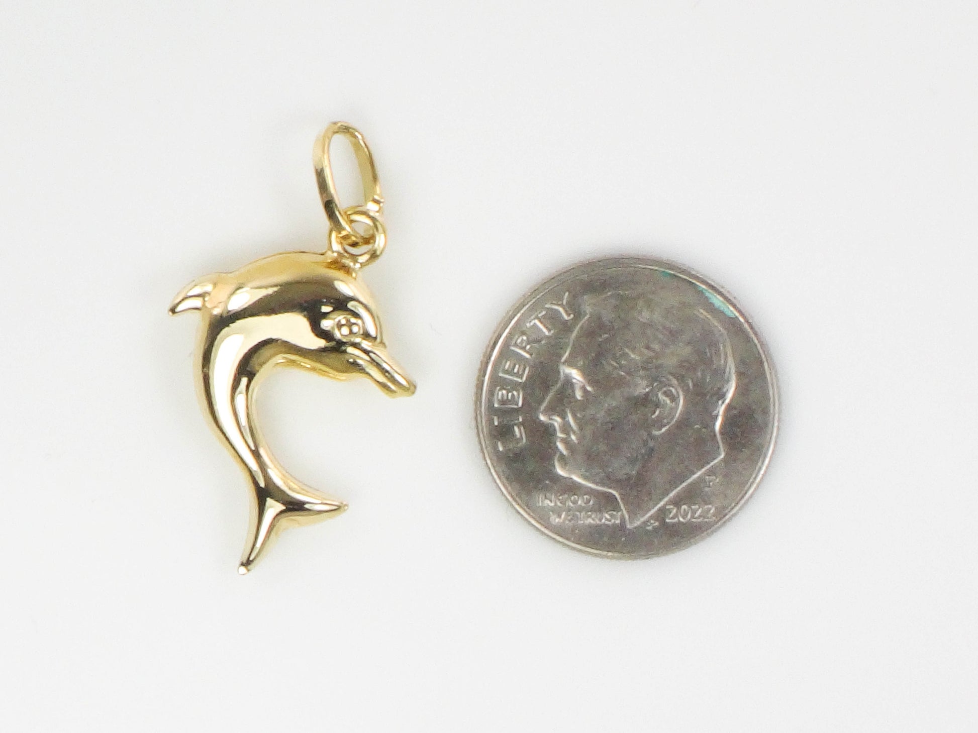 Vintage 14k Yellow Gold Puffed Dolphin Pendant: Nautical Charm