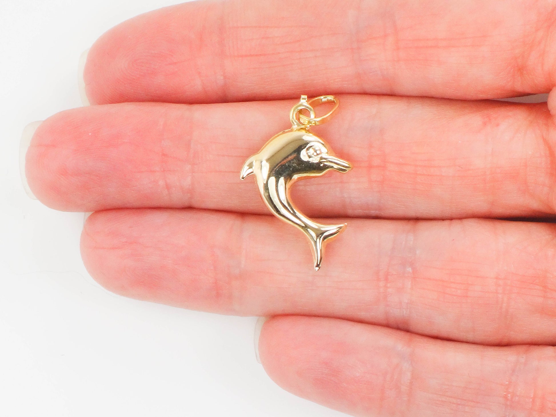 Vintage 14k Yellow Gold Puffed Dolphin Pendant: Nautical Charm