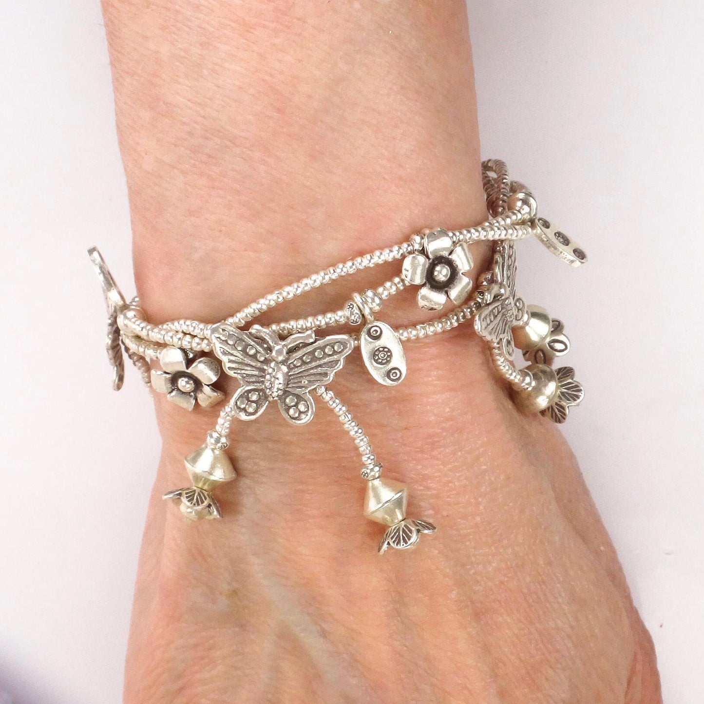 Vintage Sterling Silver Butterfly and Flower Dangle Charm Bracelet - Three Strand Floral Bracelet - 7.25"