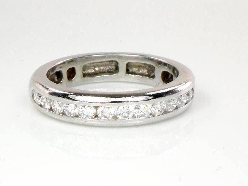Vintage Platinum Diamond Wedding Band: Round Cut, .70 Carat, Size 8