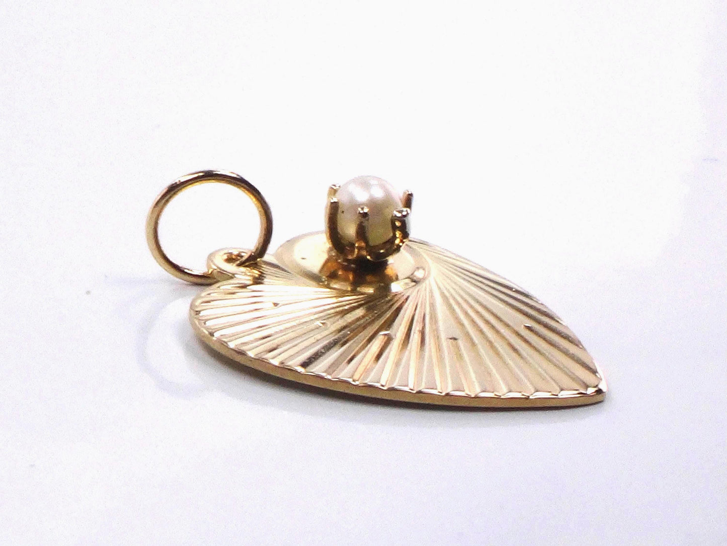 Vintage 14k Gold Heart Pendant: Pearl and Sunburst Design