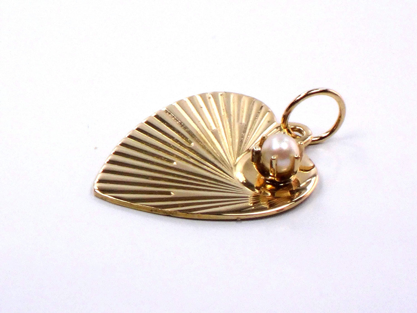 Vintage 14k Gold Heart Pendant: Pearl and Sunburst Design